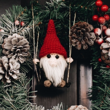 Gnome on a swing ornament amigurumi pattern by Octopus Crochet