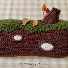 Brown log cushion amigurumi pattern by Happy Coridon