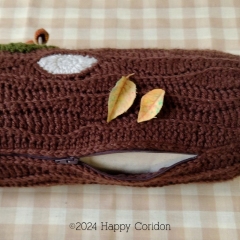 Brown log cushion amigurumi by Happy Coridon