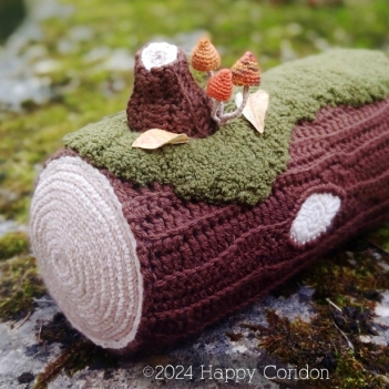 Brown log cushion amigurumi pattern by Happy Coridon