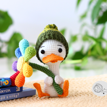 Duck with flower crochet pattern amigurumi pattern by yarnacadabra