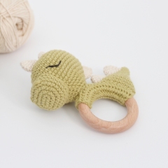 Dinosaur baby rattle amigurumi by AmiGuide