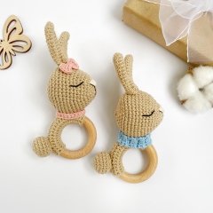 Bunny baby rattle amigurumi pattern by AmiGuide