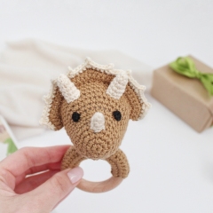 Dinosaur Triceratops rattle toy amigurumi pattern by AmiGuide