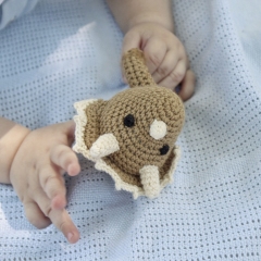 Dinosaur Triceratops rattle toy amigurumi pattern by AmiGuide