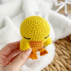 Duck baby rattle toy amigurumi by AmiGuide