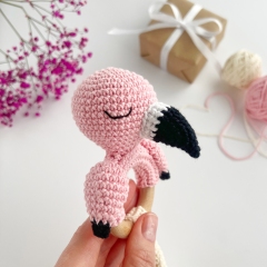 Flamingo baby rattle amigurumi by AmiGuide