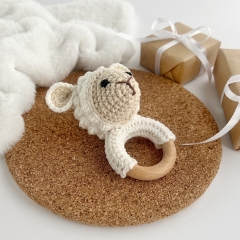 Sheep baby rattle amigurumi pattern by AmiGuide