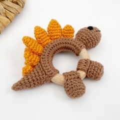 Dinosaur Stegosaurus rattle toy amigurumi pattern by AmiGuide