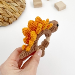 Dinosaur Stegosaurus rattle toy amigurumi by AmiGuide