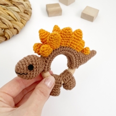Dinosaur Stegosaurus rattle toy amigurumi pattern by AmiGuide