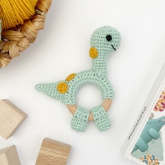 Dinosaur brontosaurus rattle toy amigurumi pattern by AmiGuide