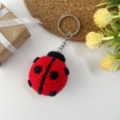 Mini ladybug keychain amigurumi pattern by AmiGuide