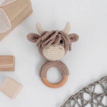Highland cow baby rattle amigurumi pattern by AmiGuide