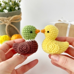 Tiny rubber duck toy amigurumi pattern by AmiGuide