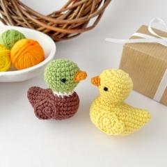 Tiny rubber duck toy amigurumi by AmiGuide