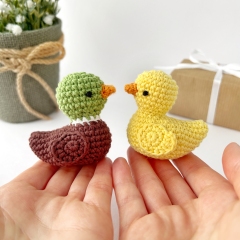 Tiny rubber duck toy amigurumi pattern by AmiGuide