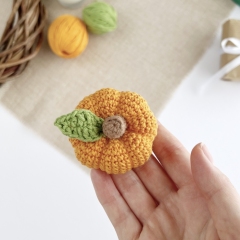 Mini pumpkin keychain amigurumi by AmiGuide