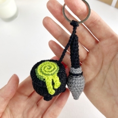 Halloween cauldron with broom amigurumi by AmiGuide