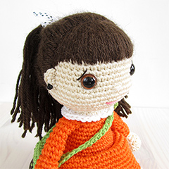 Girl in a dress with a messenger bag amigurumi by Kristi Tullus