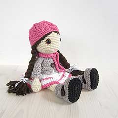 Girl in a dress, jacket, boots and hat amigurumi pattern by Kristi Tullus