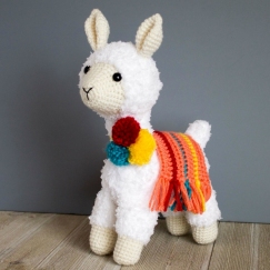 fuzzy llama with pom poms